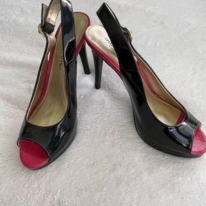 Open toed patent leather sling back high heels